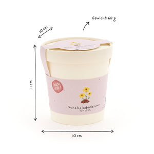 Pot de fleurs beige avec banderole violette, inscription "Fleur en chocolat pour toi", dimensions 11 cm de haut, 10 cm de large et poids 60 g.