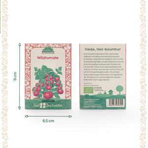 Deux paquets de graines de tomates sauvages de "Die Stadtgärtner" mesurant 9 cm de haut et 6,5 cm de large, avec une illustration de la plante au recto et un texte descriptif au verso.