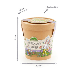 Mug marron avec couvercle, motif de lapin de Pùques coloré et inscription « Easter Flowers Mug », à cÎté sont indiquées les dimensions (10 cm de diamÚtre, 11 cm de hauteur) et le poids (60 g).