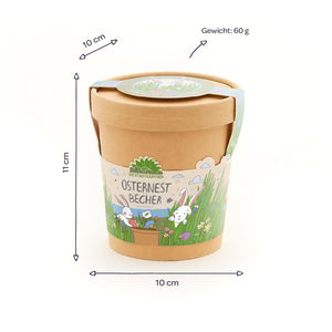 Gobelet en papier avec motif de Pâques, inscription "Easter Nest Cup", dimensions 10 x 11 cm, poids 60 g, décoré de lapins et d'une prairie printanière.