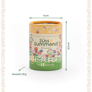 Boîte ronde avec motif floral et inscription « Sweet & Buzzing Meadow », dimensions 6 cm de diamètre, 8,5 cm de hauteur, poids 55 g.