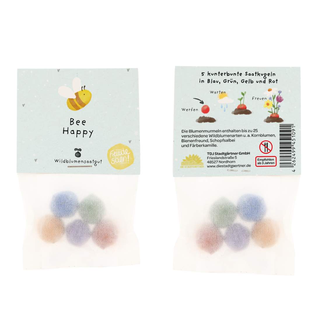 Billes de fleurs dans un sac en verre