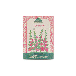 Sachet de graines de rose trémière avec illustration colorée de la plante et motif décoratif.