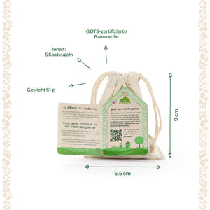 Petit sac en coton certifié GOTS avec 5 boules de graines, poids 61 g, 6,5 cm de large et 9 cm de haut, avec instructions de plantation en allemand.