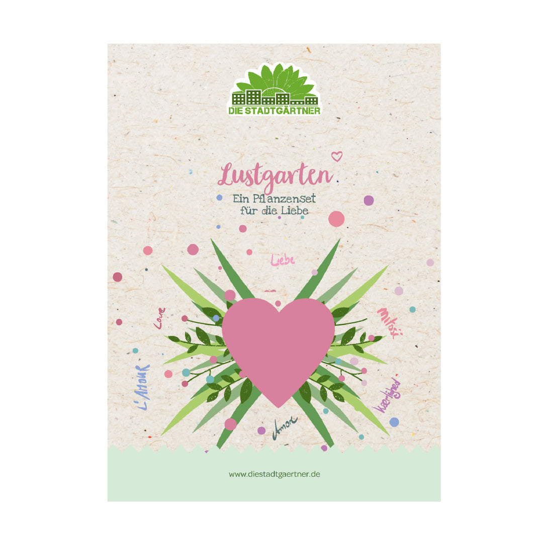 Emballage pour un ensemble de plantes avec un grand cœur rose, des feuilles vertes et l'inscription « Lustgarten – Un ensemble de plantes pour l'amour » sur fond beige.