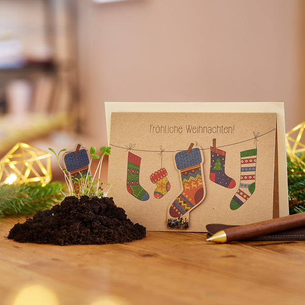 Carte de Noël avec motif de chaussettes et graines à planter