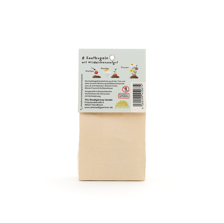 Sachet en papier avec étiquette pour 8 boules de graines de fleurs sauvages, décrit en allemand.