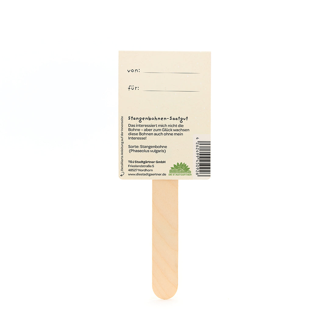 Utilisez un panneau en papier rectangulaire, avec des champs de texte « de : » et « pour : » et des informations sur les graines de haricots verts en allemand.
