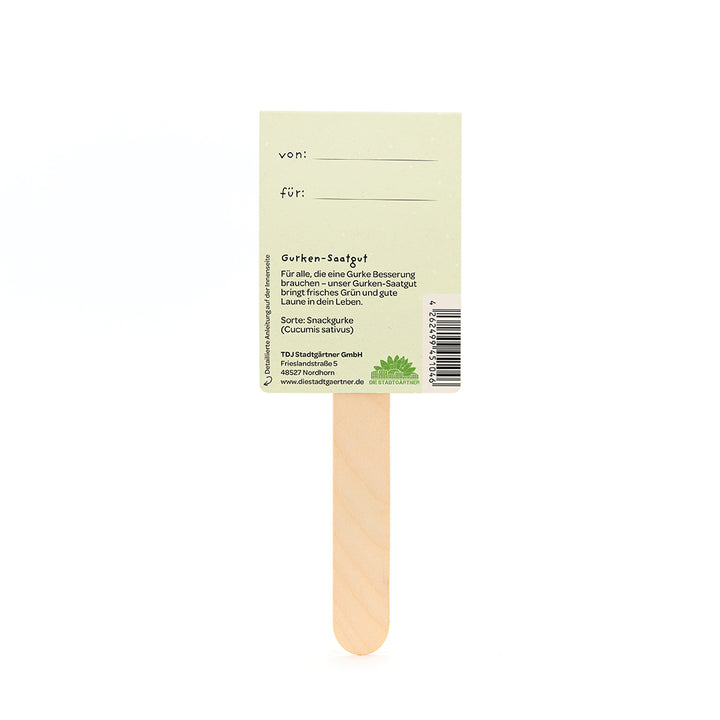 Dos d'un bâtonnet de graines de concombre en bois avec les étiquettes « de » et « pour » et les informations sur le produit.