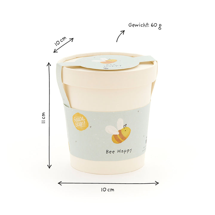 Mug avec couvercle, motif abeille bleu clair et inscription "Bee Happy", dimensions 11 cm de hauteur, 10 cm de diamètre, poids 60 g.