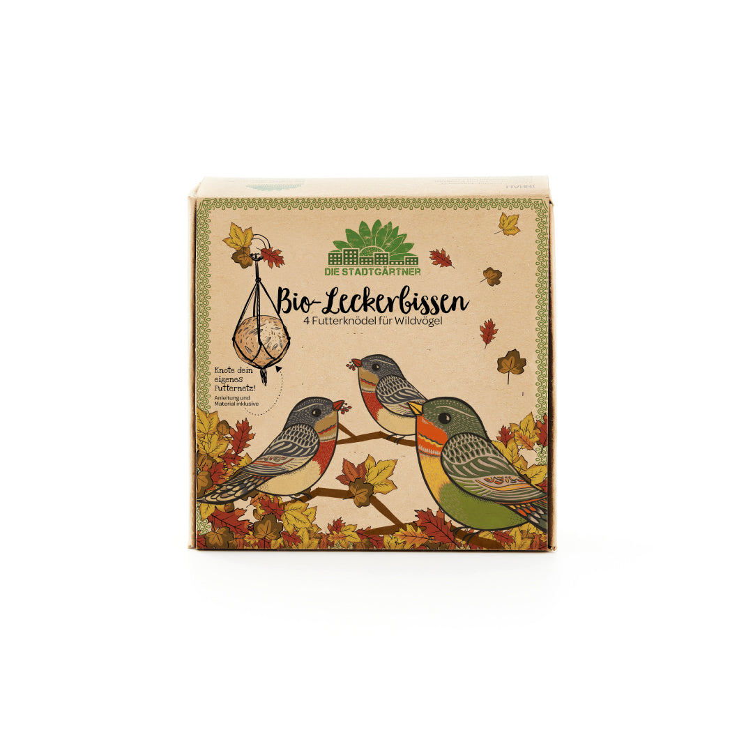 Emballage de nourriture pour oiseaux « Bio-Tasty » de Die Stadtgärtner avec des oiseaux sauvages illustrés et des feuilles d'automne.