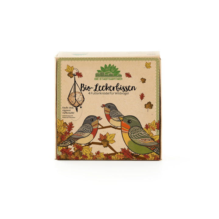 Emballage de nourriture pour oiseaux « Bio-Tasty » de Die Stadtgärtner avec des oiseaux sauvages illustrés et des feuilles d'automne.
