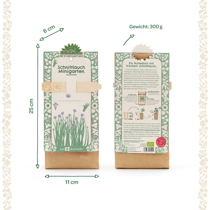 Deux packs d'un mini kit de culture de ciboulette avec un motif floral vert et blanc, dimensions 25 x 11 x 6 cm, poids 300 g, recto et verso visibles, informations produit en allemand.