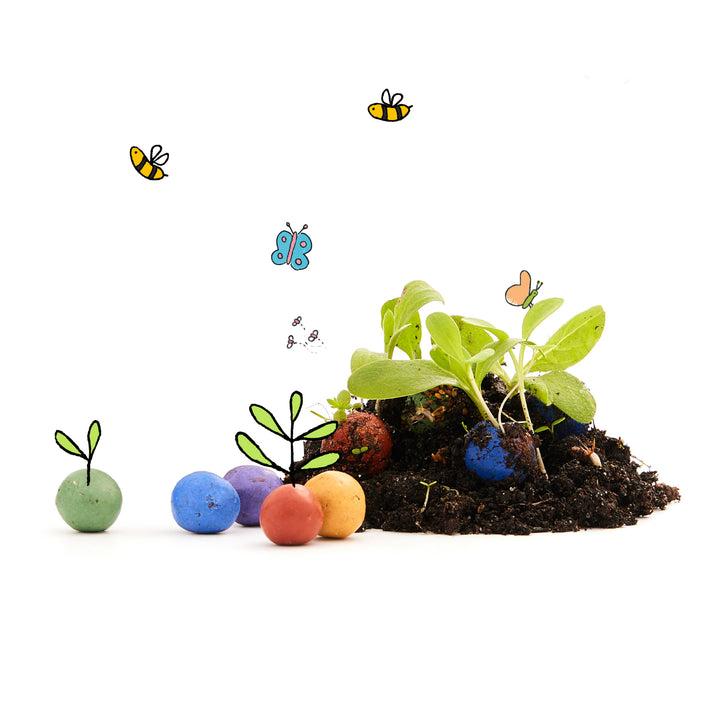 Les jeunes plantes poussent à partir de fruits à noyau colorés dans le sol avec des papillons ressemblant à des dessins animés en arrière-plan.