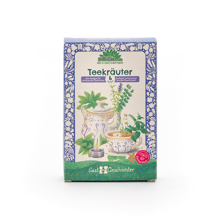 Emballage pour graines de tisane de Saatgeschwister avec des tasses à thé et des herbes illustrées sur le devant.