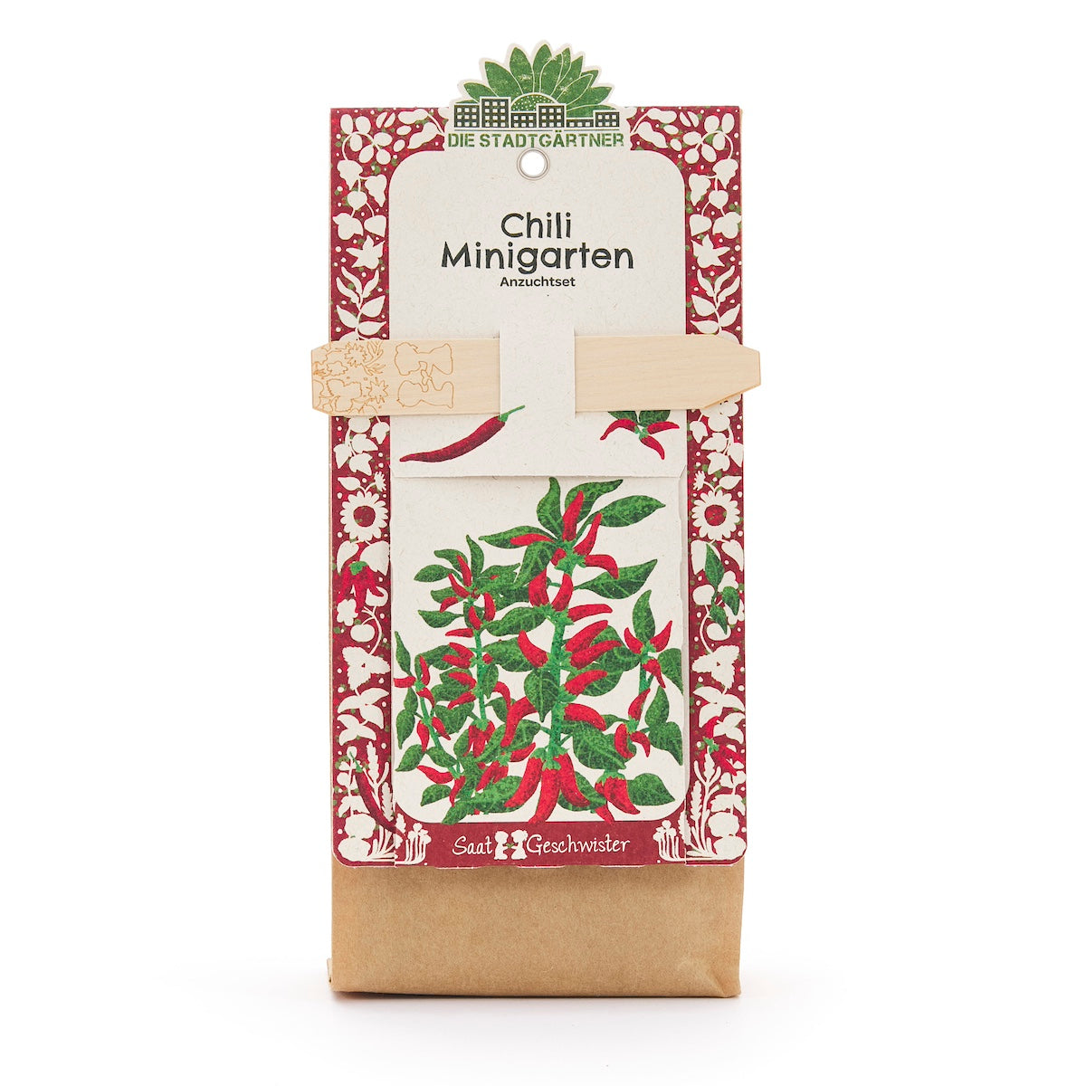 Kit de culture de mini-jardin de piments de Die Stadtgärtner avec motif de plantes rouges et vertes sur l'emballage.