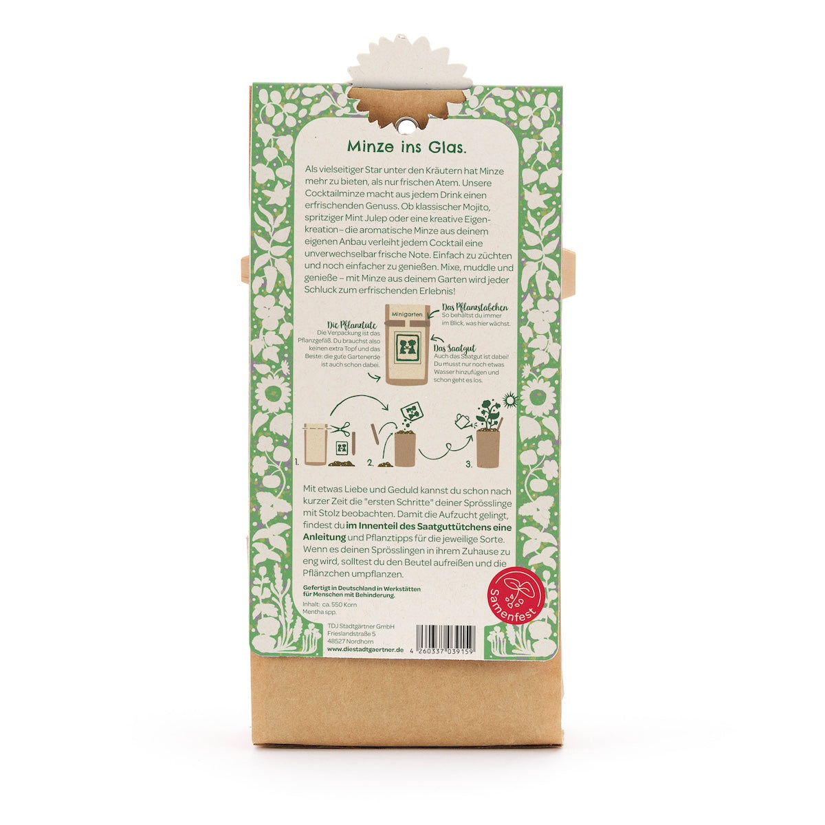 Dos d'un emballage avec des instructions pour faire pousser de la menthe dans un bocal en verre, entouré d'un motif floral vert et blanc.