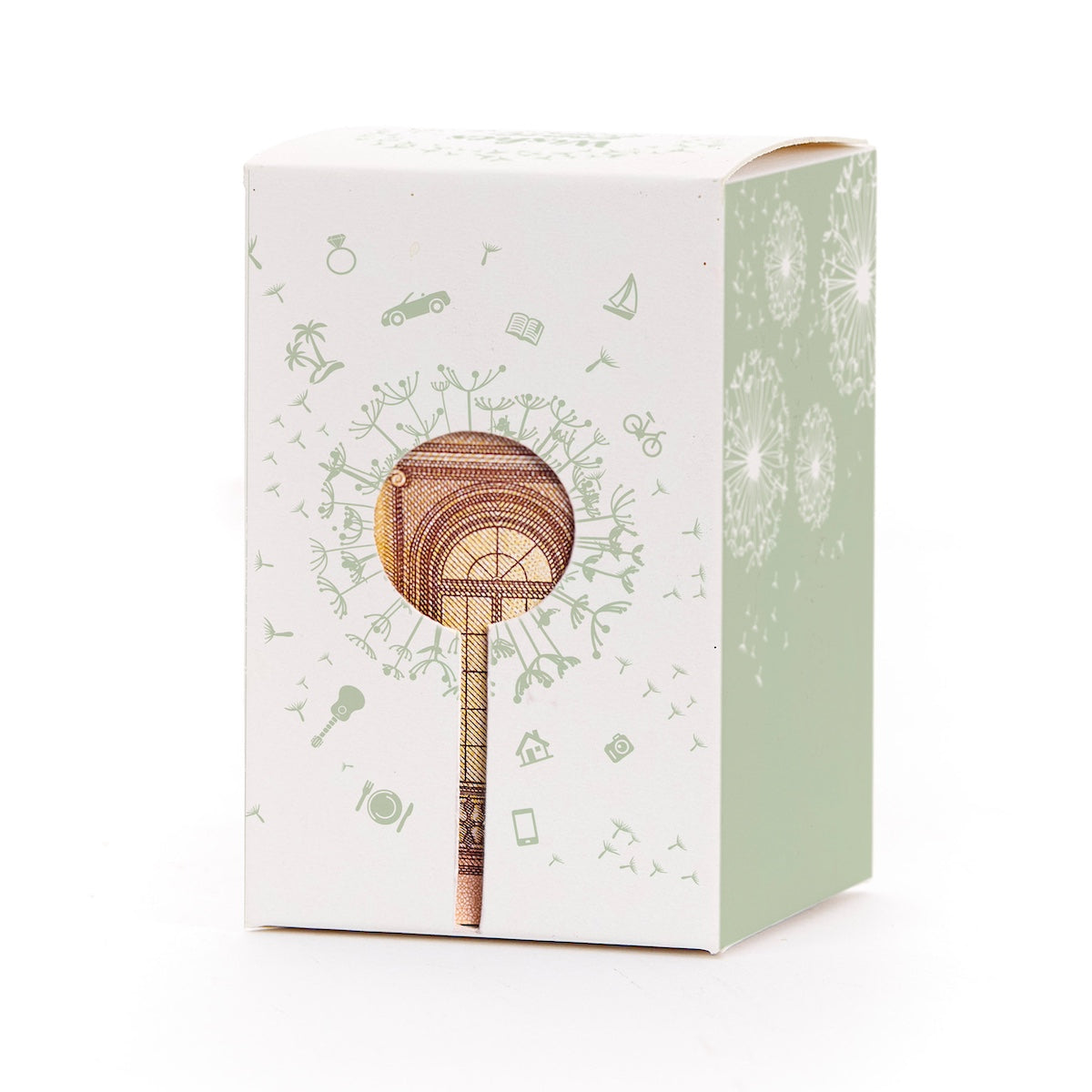 Coffret cadeau avec motif pissenlit et billet de banque en forme de sucette en guise de décoration.