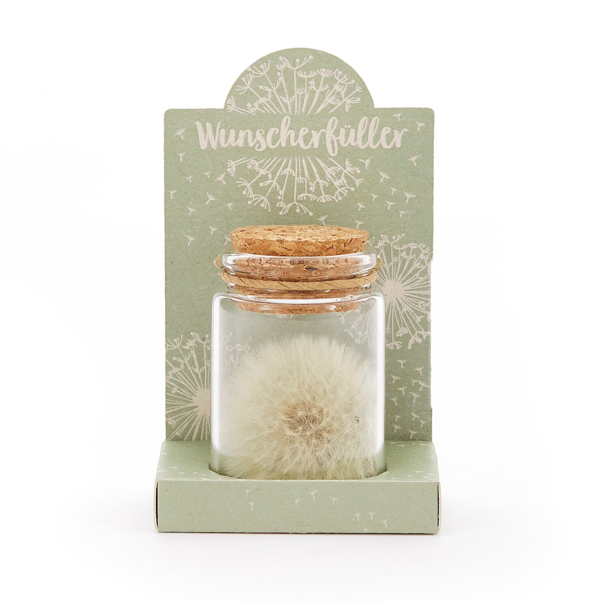 Bouteille en verre avec pissenlit et liège, sur carton vert avec l'inscription "Wish Fulfiller".