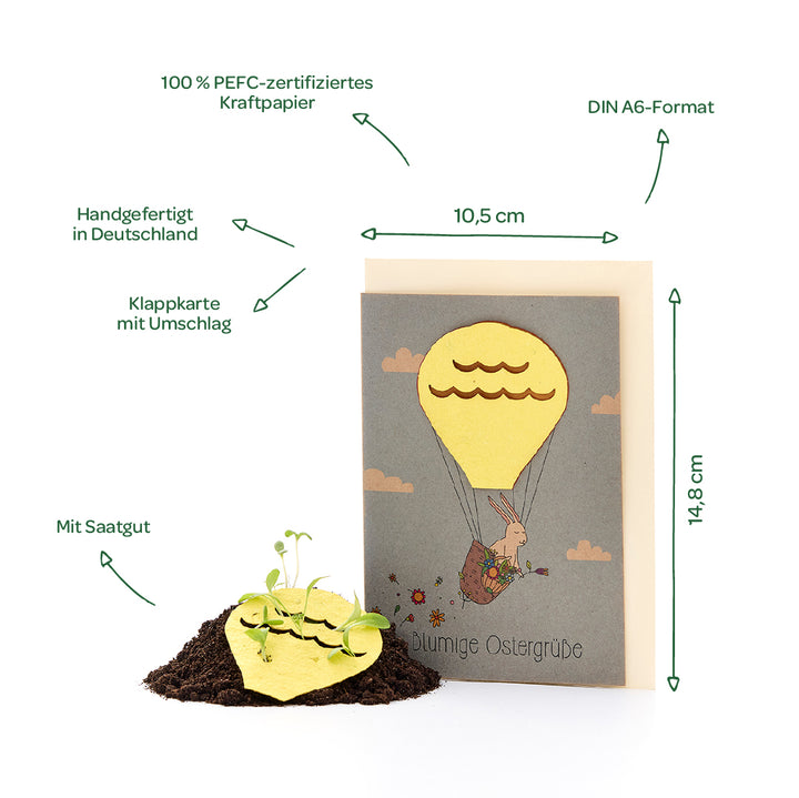 Carte pliante avec enveloppe au format DIN A6, fabriquée à la main en Allemagne à partir de papier kraft 100% certifié PEFC, comprenant des graines et un motif de lapin dans une montgolfière ; les dimensions et les caractéristiques sont étiquetées.