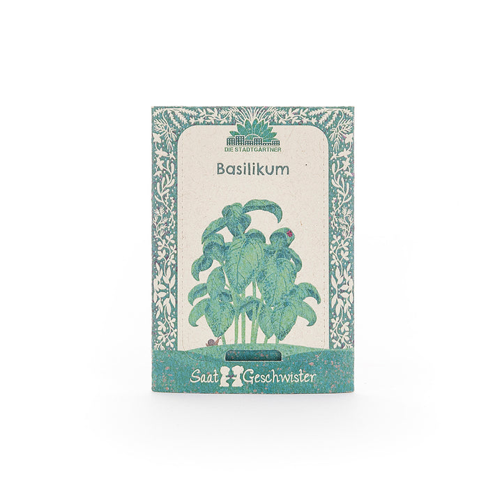 Sachet de graines pour basilic de la marque "Saatgeschwister" avec une illustration de feuilles de basilic sur le devant.