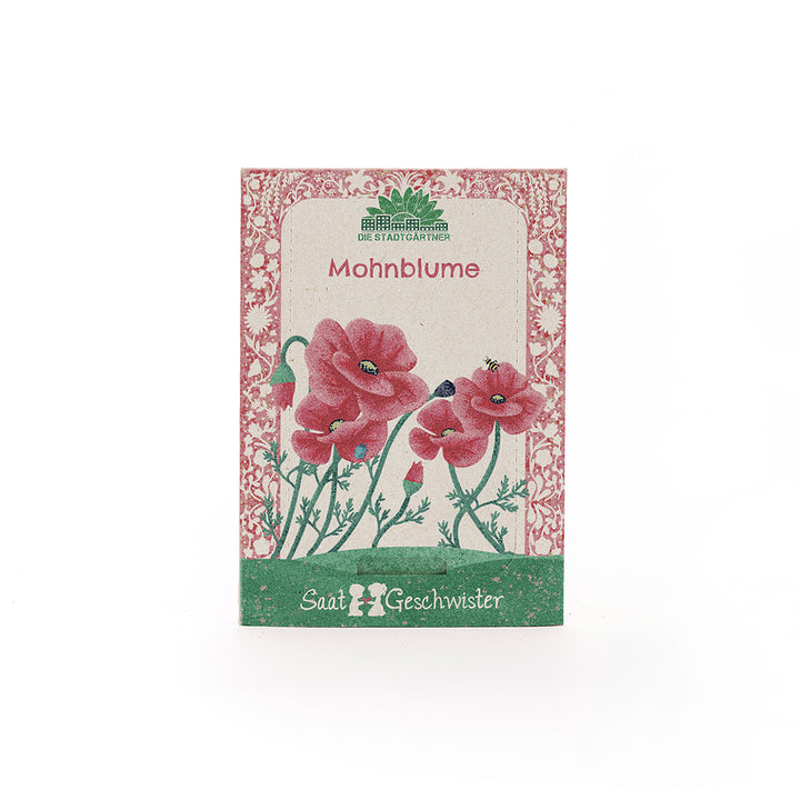 Sachet de graines avec illustration de coquelicots rouges et inscription "Poppy" et "Seed Siblings".