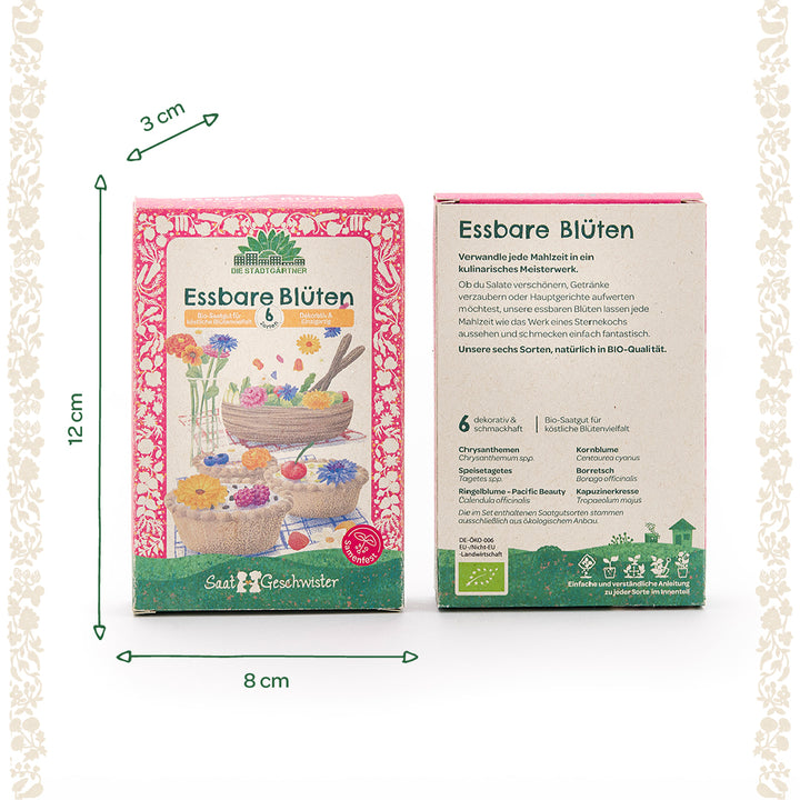 Deux emballages étiquetés « Fleurs comestibles » par Die Stadtgärtner, chacun comportant des illustrations de fleurs colorées sur des aliments, ainsi que des informations sur les produits et des descriptions de variétés ; les dimensions sont de 12 cm de haut, 8 cm de large et 3 cm de profondeur.