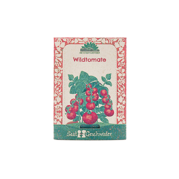 Sachet de graines étiqueté « Tomate sauvage » et comportant une illustration de plants de tomates.