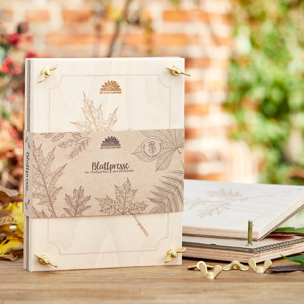 Presse à feuilles pour l'automne