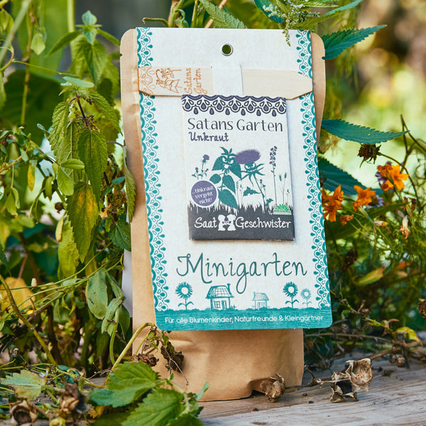 Emballage de "Saat & Geschwister Minigarten" avec l'inscription "Satan's Garden Weeds" en vert.