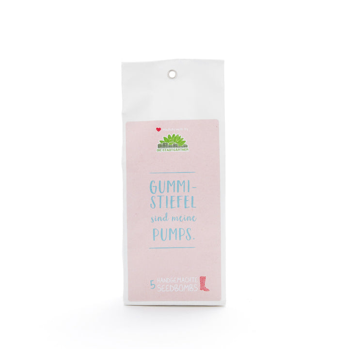 Emballage d'une « Seed Bomb » avec l'inscription « Les bottes en caoutchouc sont mes pompes » et le logo « Die Stadtgärtner » (Les jardiniers de la ville).
